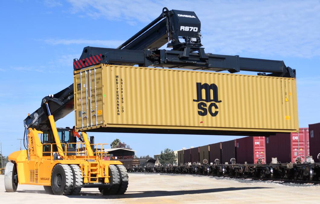 One of the trucks at the Crawfords Freightlines intermodal rail facility in action. Photo: Gareth Gardner