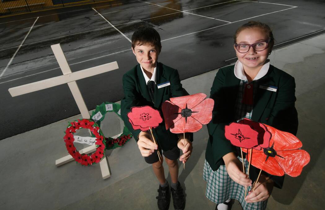 LEST WE FORGET: Hillvue Public School captains Nickolas Piper and Ruby Vidler have been practicing their speech for Anzac Day. Photo: Gareth Gardner
