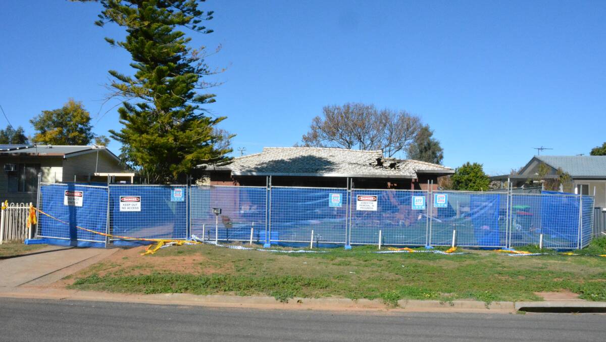 The property now has a fence around it to clean up asbestos within the building. Photo: Jessica Worboys