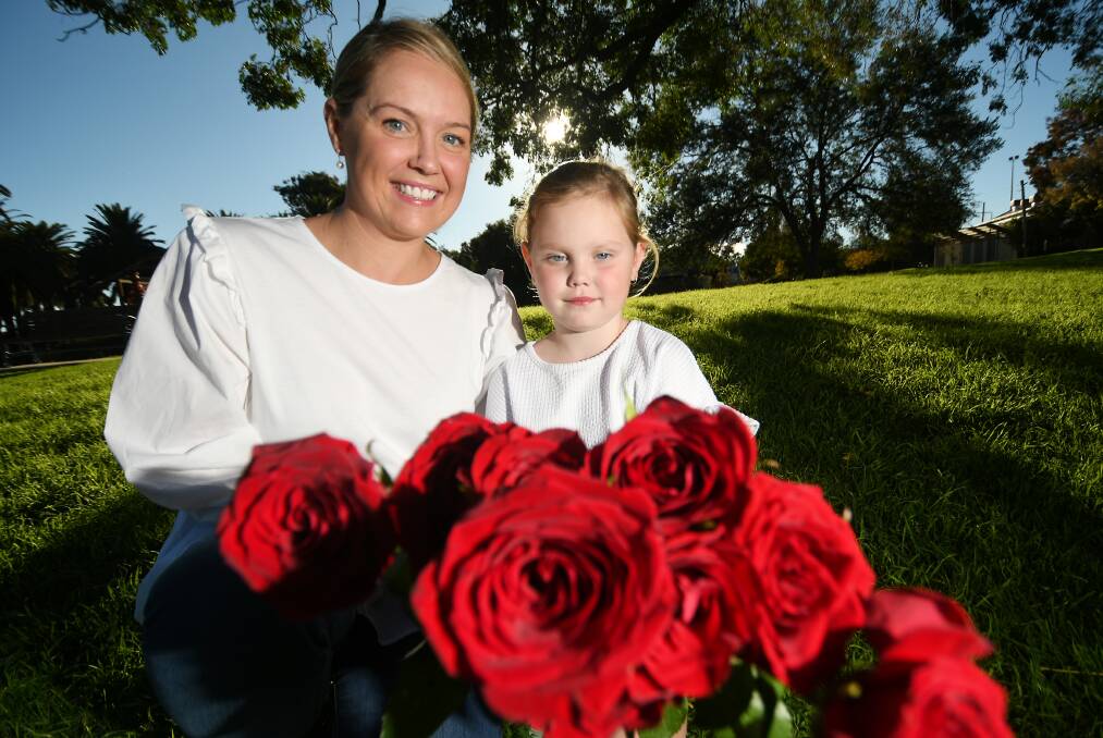 ROSES FOR CAUSE: Lexi Bartlett (pictured here with mum, Tara) has cystic fibrosis (CF). Mrs Bartlett is raising funds for 65 Roses Day for CF research. Photo: Gareth Gardner