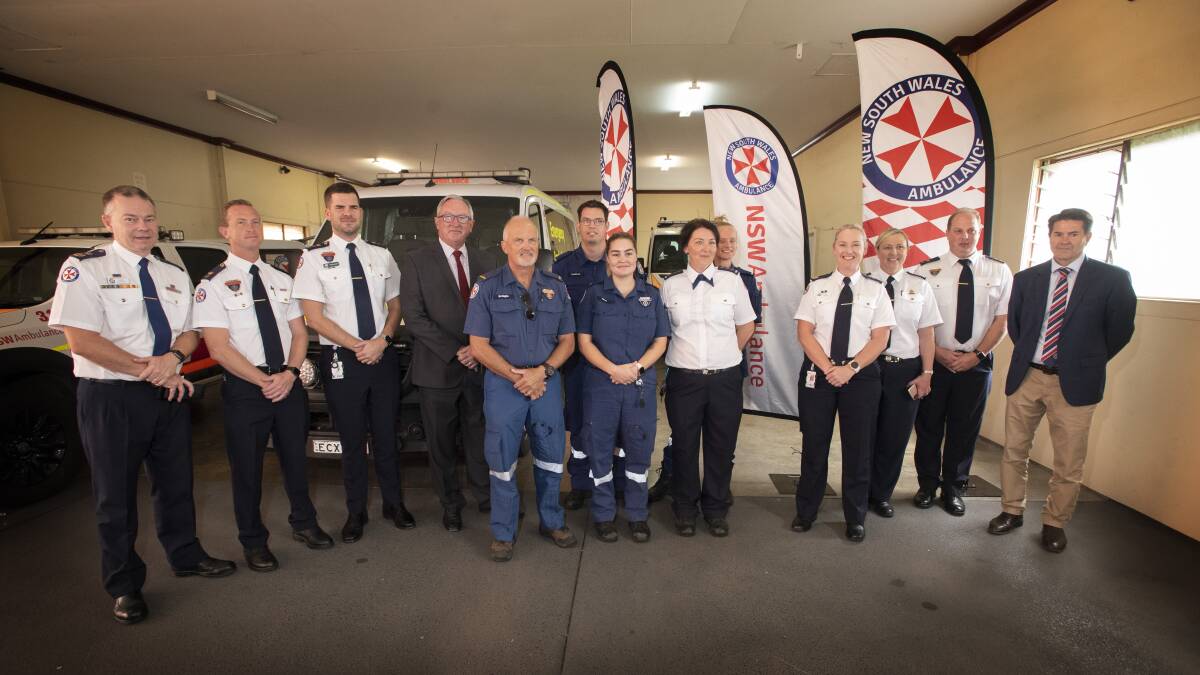 ALL IN: Local paramedics were at the announcement on Tuesday, as well as Mr Hazzard and Mr Anderson. The minister expects the new station would be up and running within two years. Photo: Peter Hardin