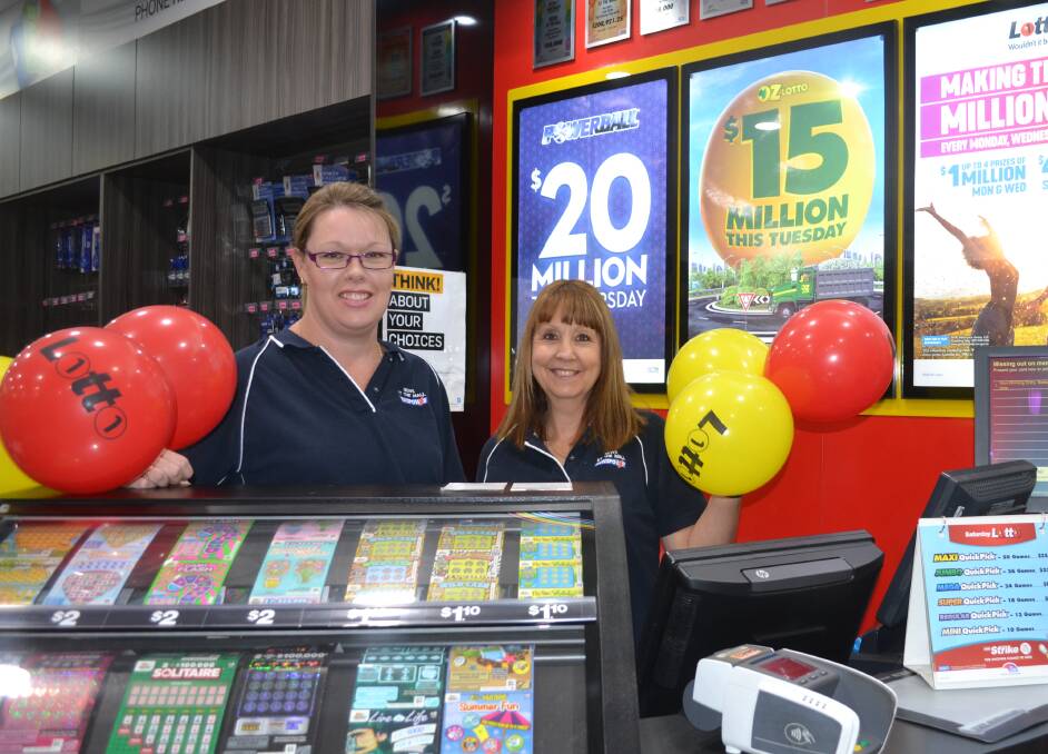 News at the Mall sales assistants Vanessa Duce and Toni Agnew celebrate the sale of a winning $1.43 million Lotto ticket from the newsagency. Photo: FAYE WHEELER