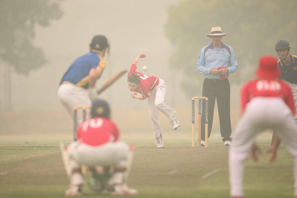 UP IN SMOKE: Junior cricketers in action at Albury on the weekend. The Bradman Cup and Kookaburra Cup were due to start at Albury-Wodonga this week but have been cancelled due to the bushfires.