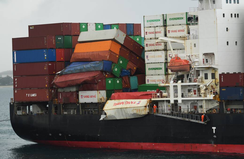 COLLAPSE: The damage on the YM Efficiency as it came into Botany Bay last week. 