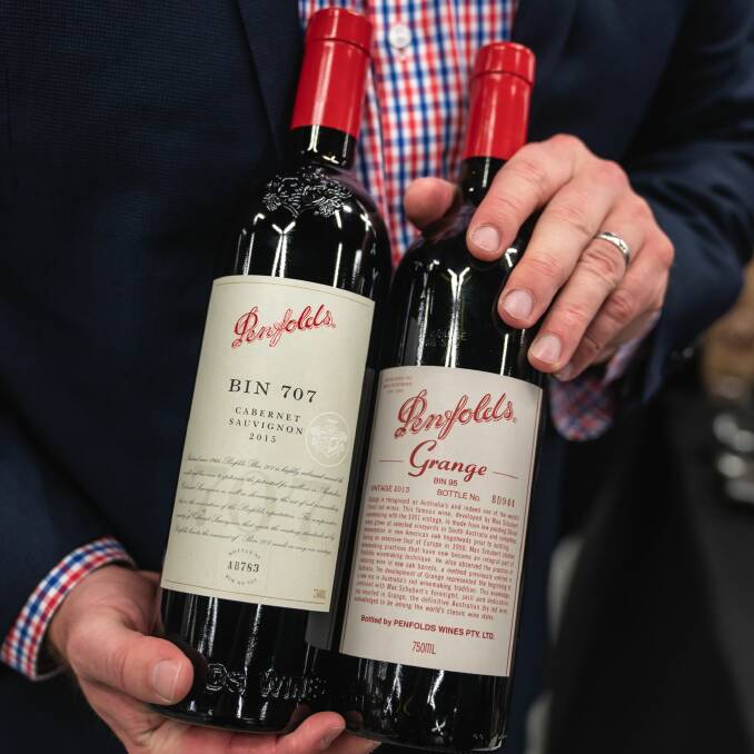 LIQUID GOLD: Christmas came early to a Sydney wine lover who successfully won a wine bidding war of a coveted Penfolds Grange set. Photo: Supplied