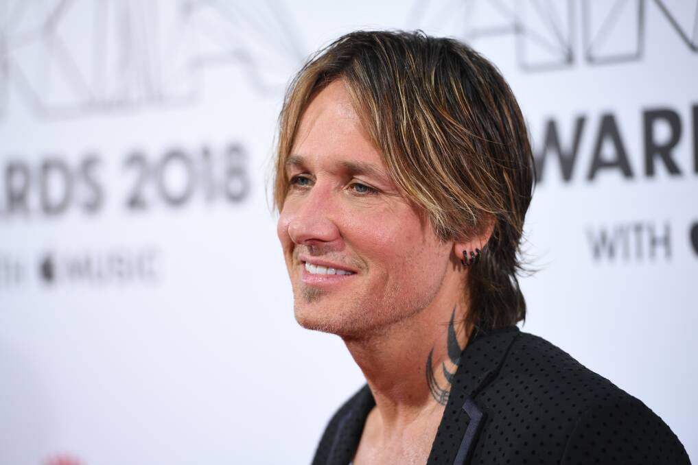 Keith Urban holds sell-out crowd in palm of his hand