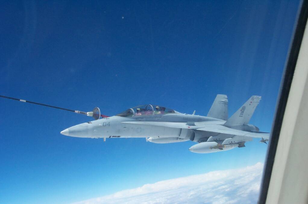 Captured the moment a fighter jet latched on to the "basket" to refuel. Photo: PATH McMAHON.