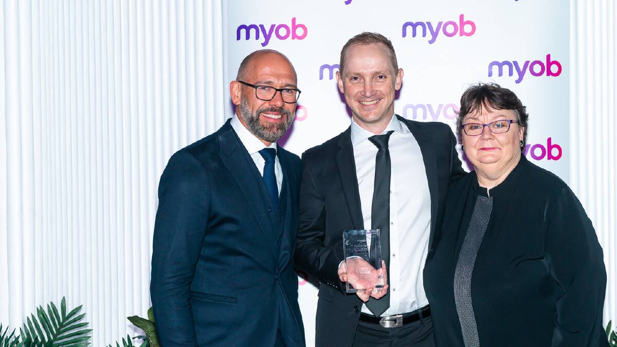 SUCCESS: Clint Bourke (Roberts & Morrow partner, winner of the MYOB Accountant of the Year award), with Tim Reed (MYOB CEO and Executive Director) and Ann Thomas (Pinnacle Client Manager). Photo supplied.