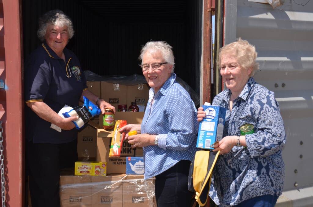 FOOD DONATIONS: Lorraine Sewell and Heather Starr from CWA groups with Dot Lockyer from the Guyra & District Historical Society & Museum.