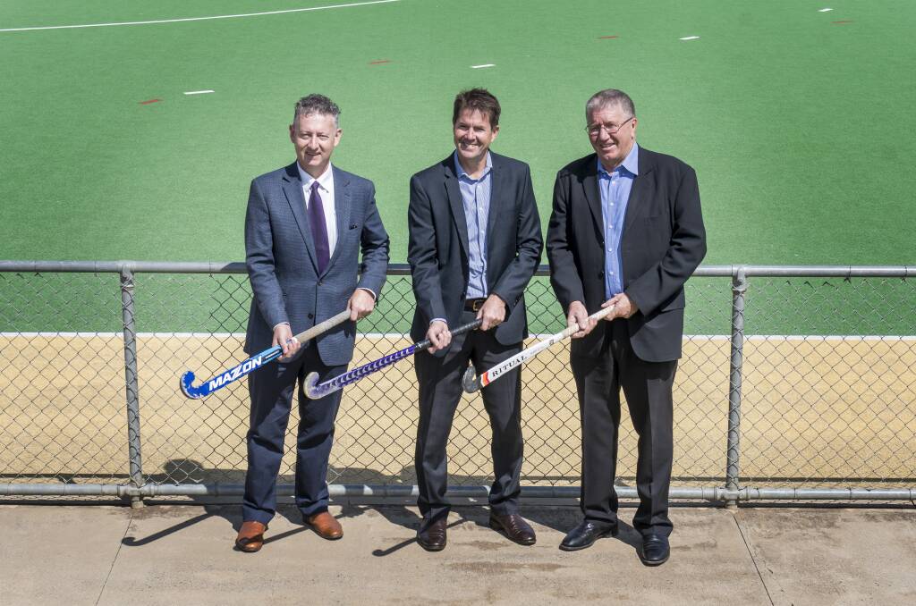 LET'S STICK TOGETHER: From left: Tamworth Hockey president Mark O'Connor, state MP Kevin Anderson and mayor Col Murray. Photo: Peter Hardin 291018PHA017