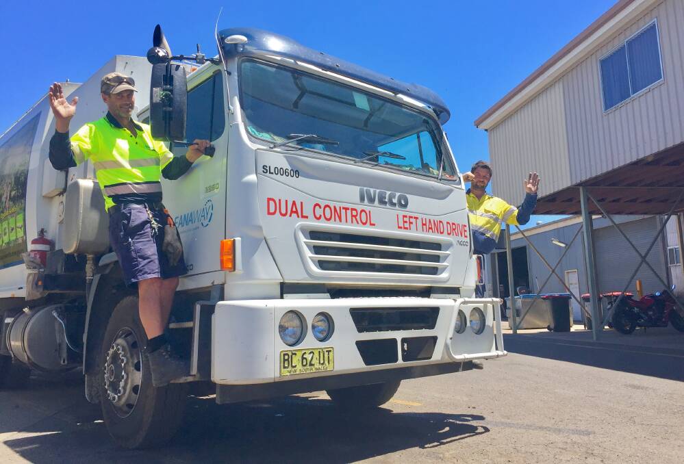 CLEAN LIVING: Tamworth garbage truck drivers Ian Collett and Trent Bruce will keep working in what's a traditionally busy week. Photo: Jacob McArthur