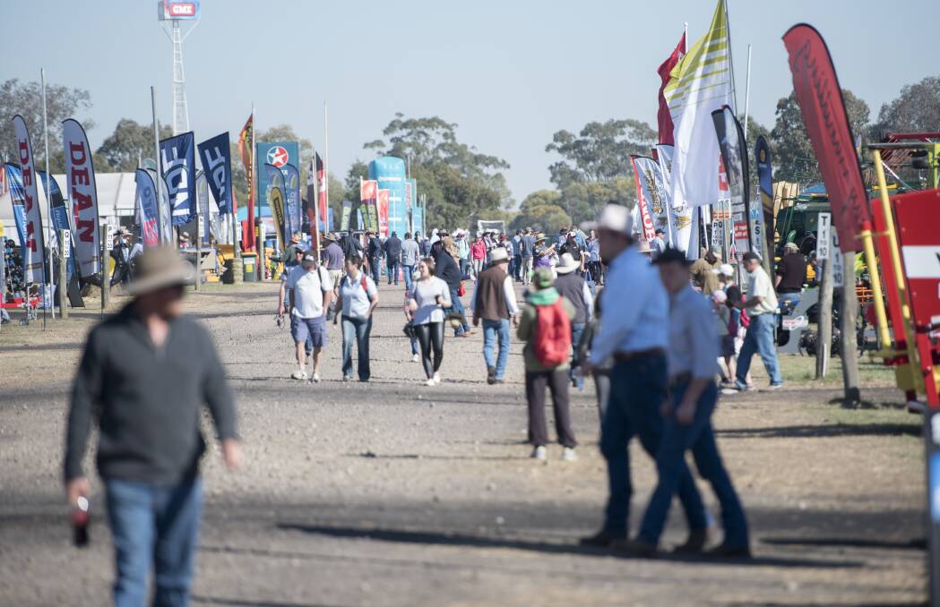HERE THEY COME: The bustling laneways of AgQuip set the scene for the NSW government to reveal its strategic plan for the region. Photo: Peter Hardin