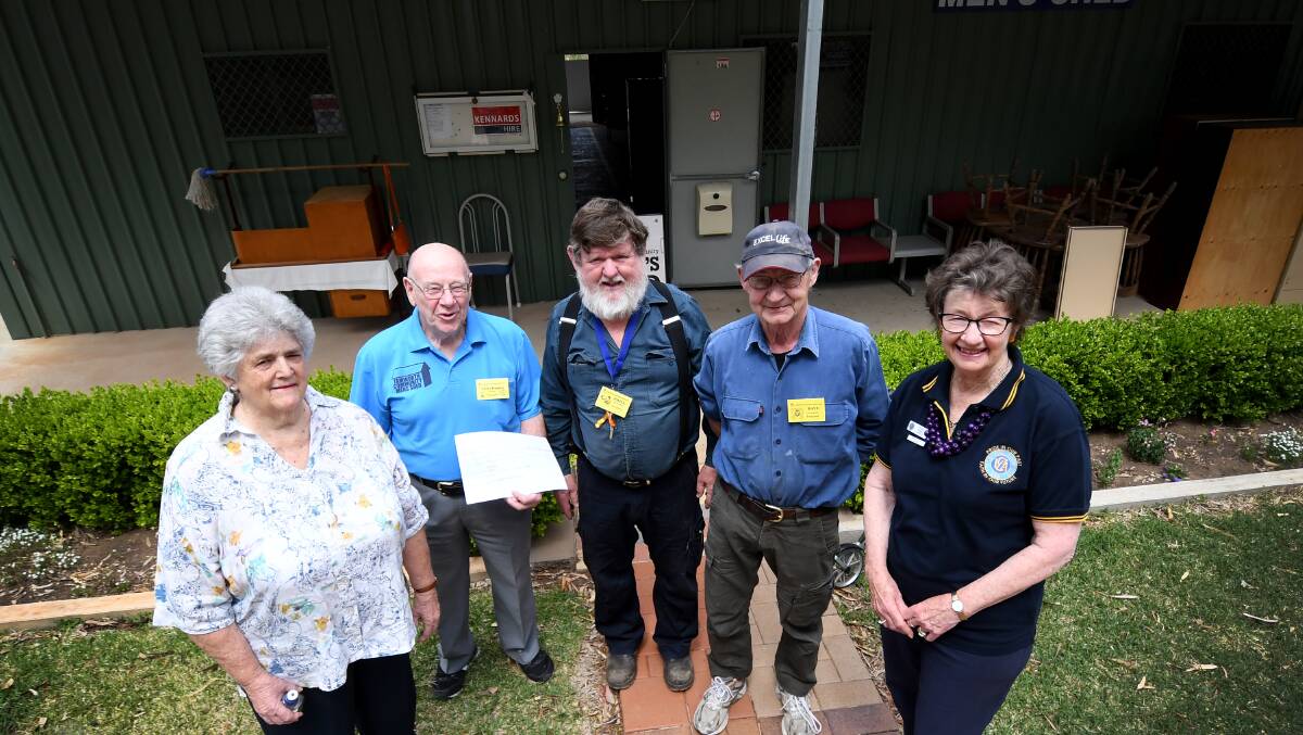 HELP FOR AFAR: Elva Shumack, Les Thurkettle, Phil Mc Farlane, Dave Greenland and Roslyn Ferris with a donation from Western Australia. Photo: Gareth Gardner 101018GGC01


