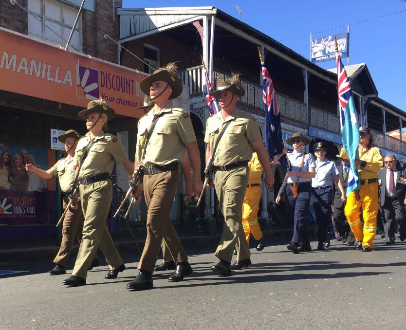 WALK OFF: Soldiers march down Manilla's main street during last year's Anzac Day service. Photo: Jacob McArthur
