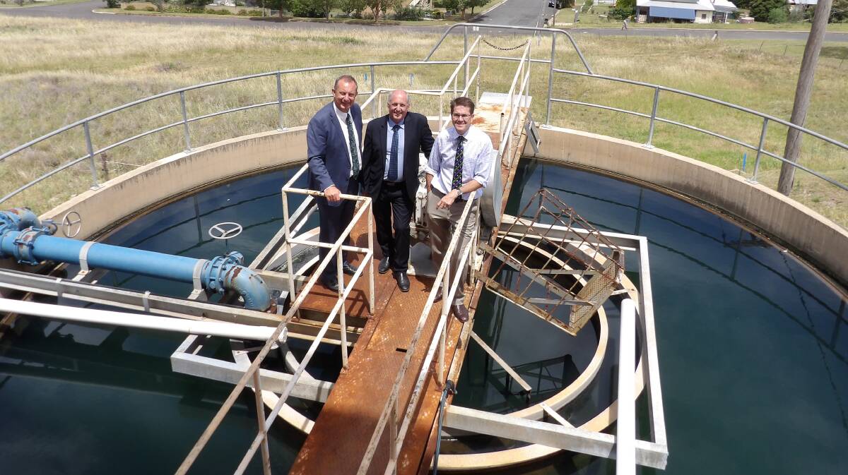 CASH SPLASH: Upper Hunter MP Michael Johnsen, Liverpool Plains mayor Andrew Hope and Tamworth MP Kevin Anderson on top of the Werris Creek water treatment plant. Photo: Supplied.