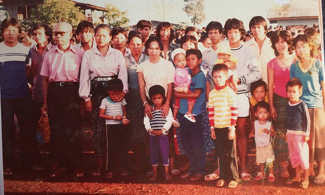 Lao Migrants in the Thai refugee camp, including Souvanny (second from right)