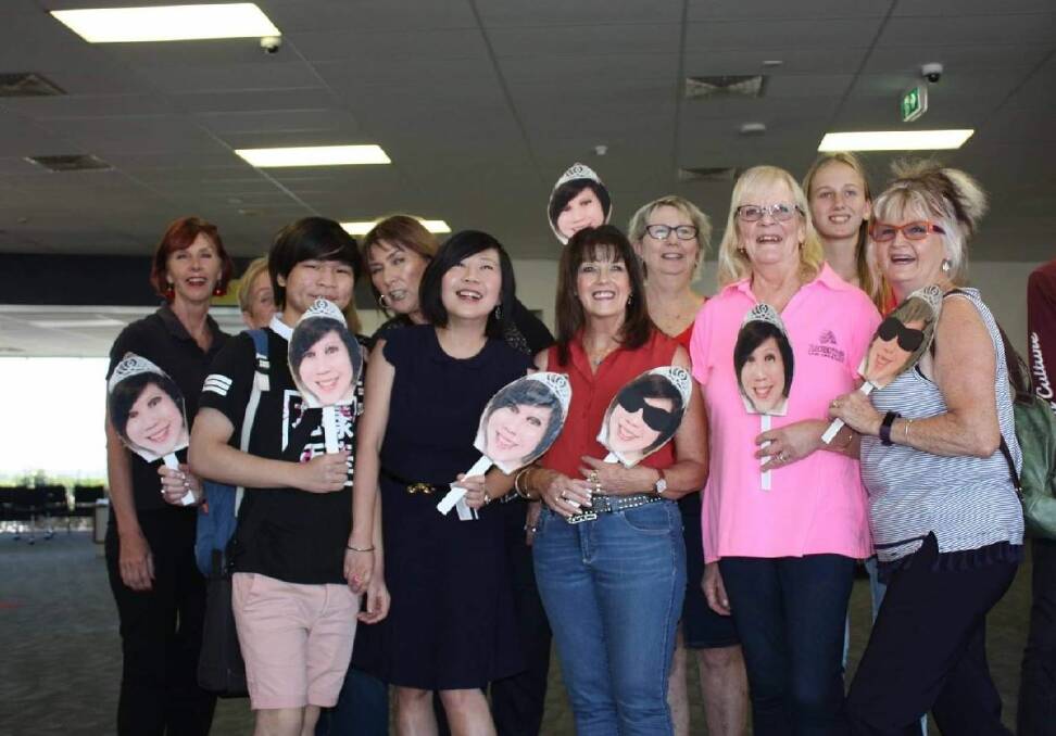 FAREWELL: Elise Yeo was treated to a flash-mob send-off at Tamworth airport recently as she departed for Singapore. Photo: Supplied