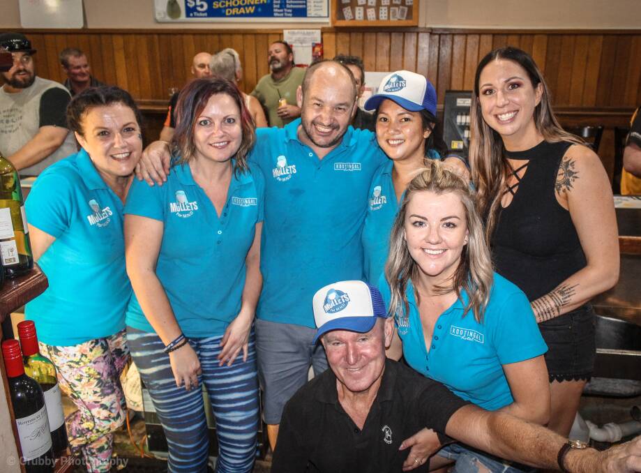 KOOTY'S KICK-IN: Andrew Yeo (middle back) with his staff during the very successful Mullets for MND fundraising night at Kootingal Hotel. Photo: Greg McDonald