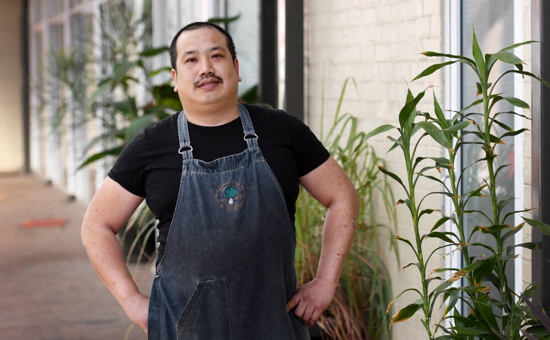 SERVING UP: Narong Sayabath and his mother run separate restaurants in Tamworth and which is a fun way to give back. Photo: Gareth Gardner