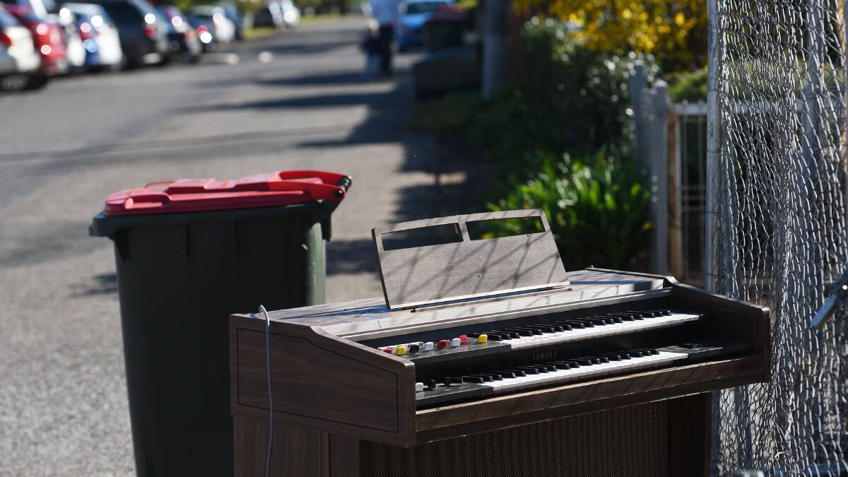 OUT OF KEY: A discarded keyboard found a home on the street ahead Tamworth's bulky waste collection which kicks off on Monday. Photo: Gareth Gardner 150617GGB05