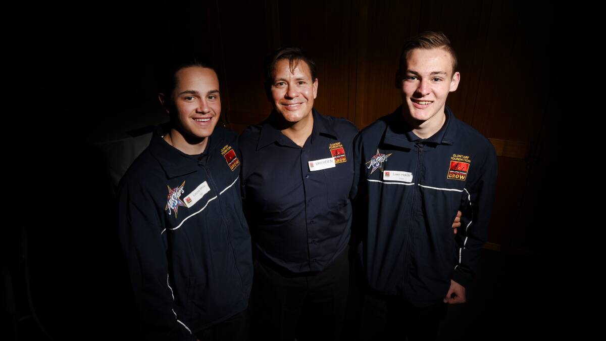 VALUABLE EXPERIENCE: Clontarf Foundation's Brenden Petterson with Oxley high students Lachie Mills and Liam Hatch. Photo: Gareth Gardner 