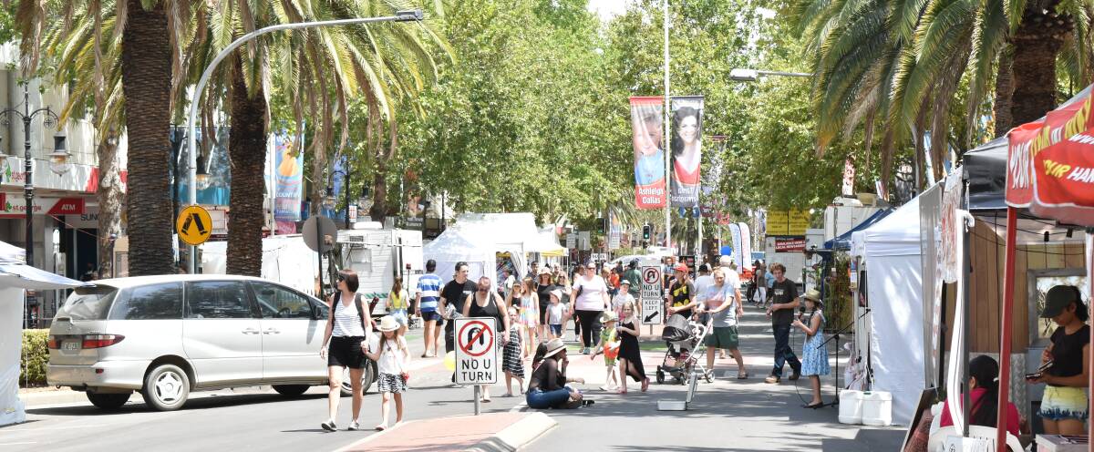 VIBE: Some shop-owners said the atmosphere was better with an extra Peel Street block opened to traffic during festival. Photo: Ben Jaffrey