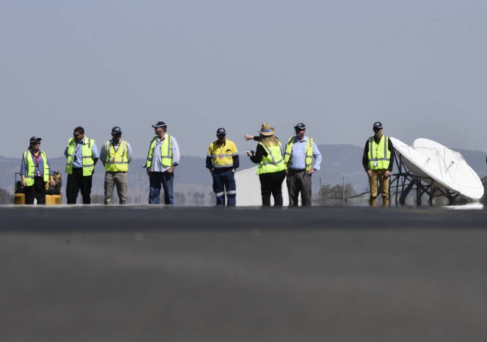 READY FOR TAKE OFF: Airport safety officers do an inspection of the Tamworth runway. Photo: Jacob McArthur