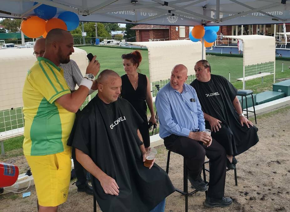 CUT CREW: A few of the Rotary club members sporting some new dos at the World's Greatest Shave fundraiser for Steve Gribbin. Photo: Supplied