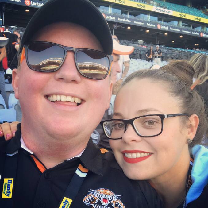 SUPER FAN: Tigers' fan Shay Quilty and his Tamworth partner Larissa Lockrey are embarking on their biggest-trek for a footy match this weekend. Photo: Supplied