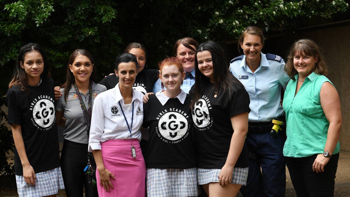 CALL TO ARMS: Guest speakers and students from the Oxley High Girls Academy International Women's Day event. Photo: Gareth Gardner 080318GGA006