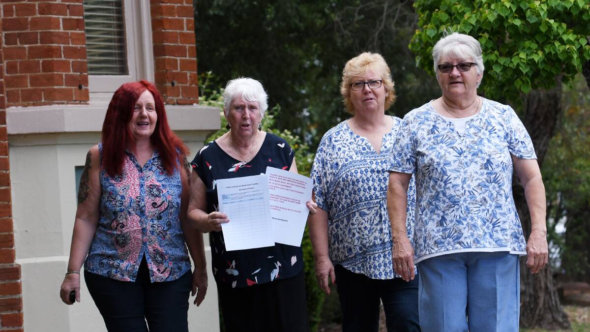 GOOD SIGNS: Di Wyatt, second from left, with the Tamworth Mental Health Carers rallying for signatures last year.  Photo: Gareth Gardner 061117GGB003