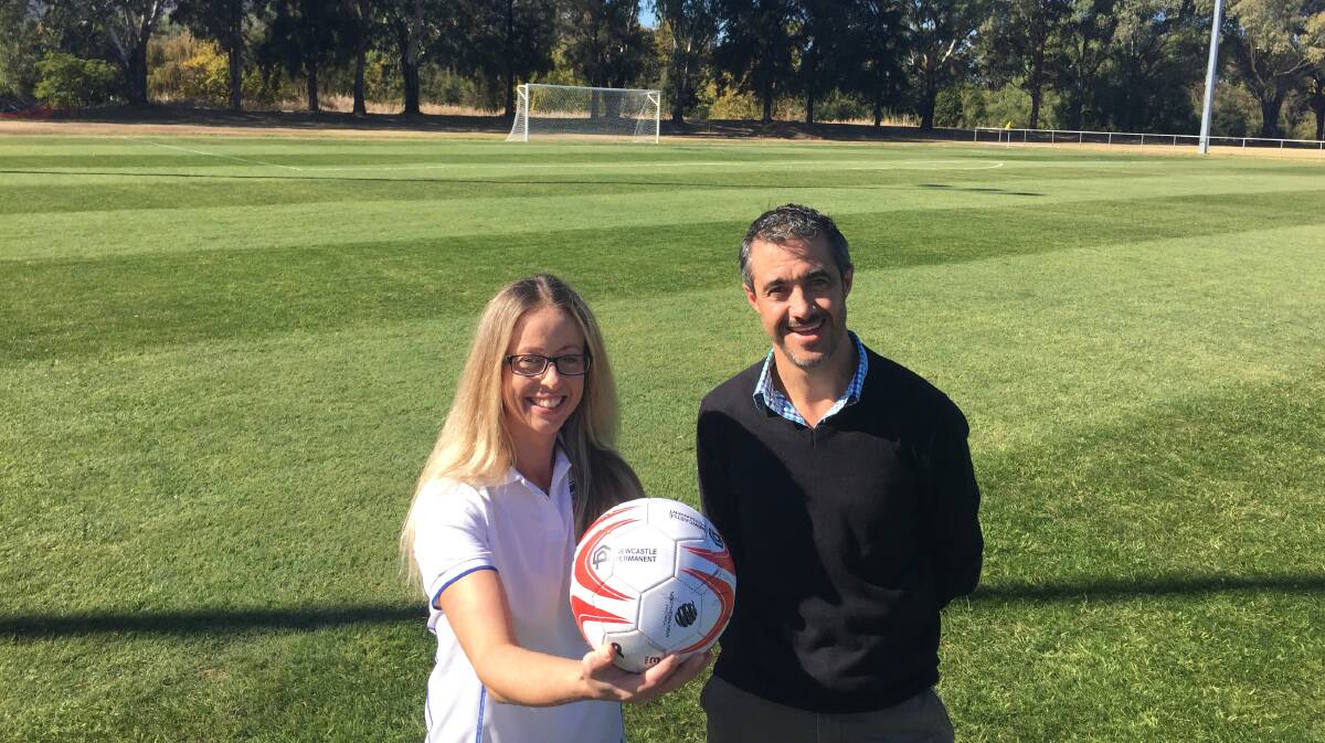 GOAL: Julia Farina with Paul Kelly at the newly redeveloped Johnson Oval which will host its first game on Saturday. Photo: Jacob McArthur