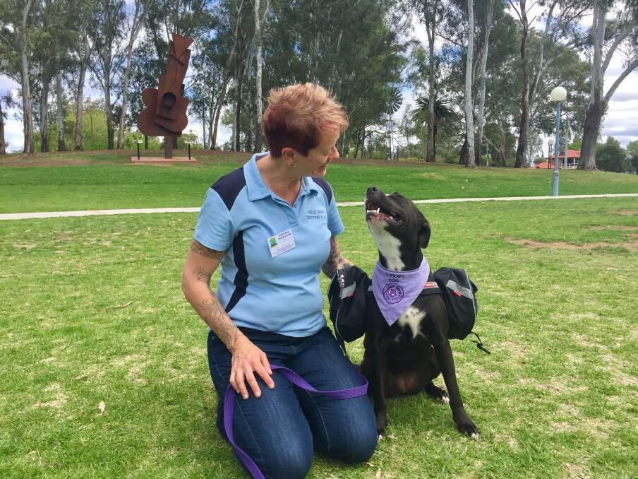 WORKING DOG: Tamworth psychologist Jennifer Black and her therapy dog Gracie who've been delivering counselling in region. Photo: Jacob McArthur