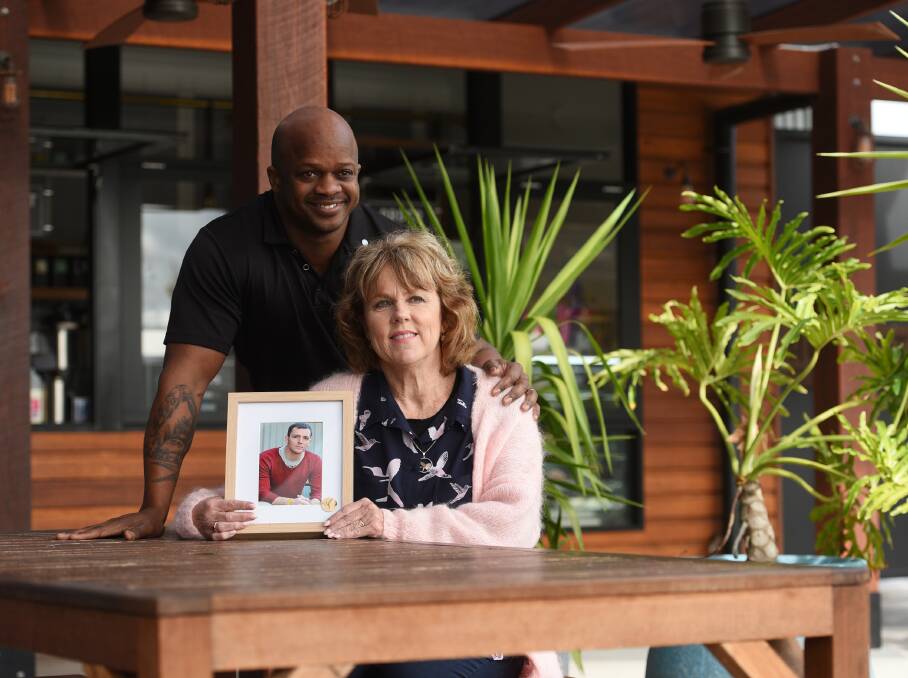 ON THE BALL: Tamworth business owner Dwone "DJ" Jones and medicinal cannabis advocate Lucy Haslam, with a photo of her late-son Dan, are calling the community for support. Photo: Gareth Gardner 310517GGB01