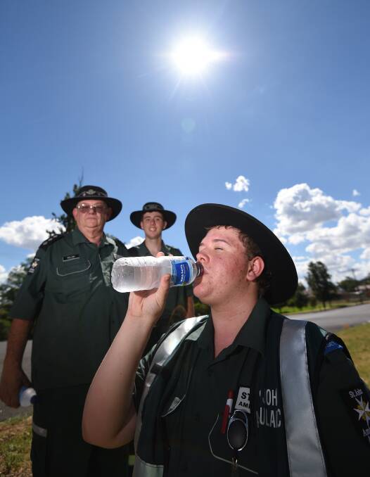 KEEP IT COOL: St John Ambulance first aiders keeping hydrated ahead of the festival. Photo: Gareth Gardner 160117GGC02