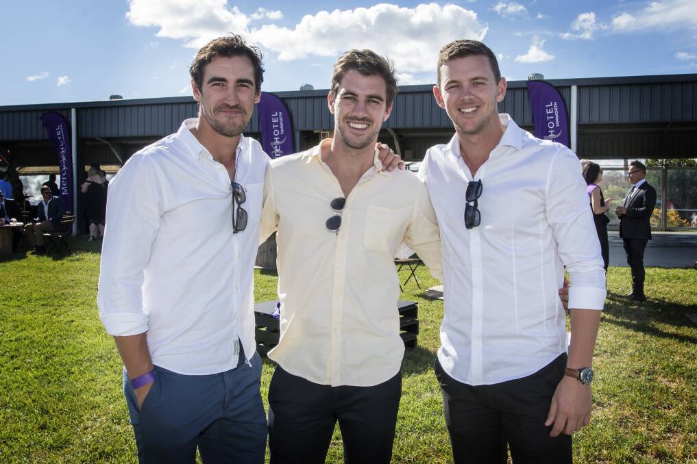 TEST HEROES: Josh Hazlewood (right) at the Tamworth Cup with his fast-bowling teammates Mitchell Starc and Pat Cummins. Photo: Peter Hardin