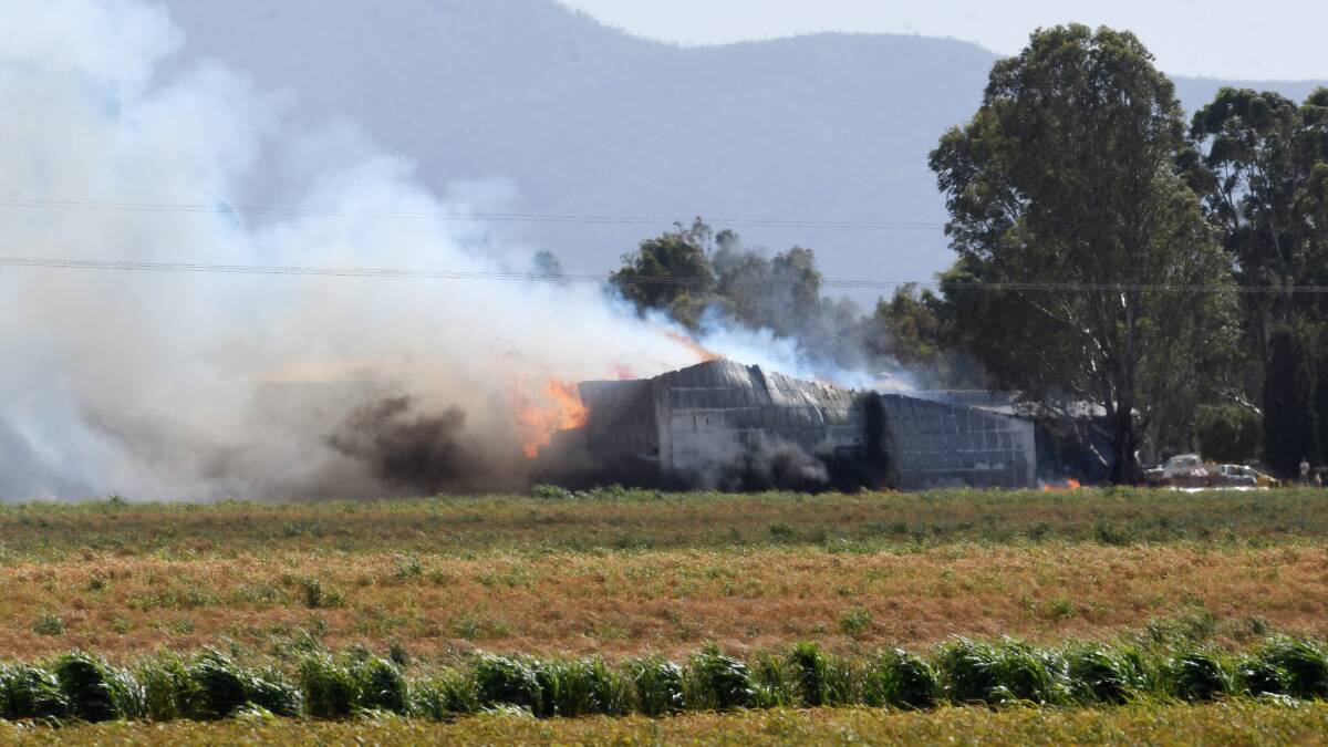 ENGULFED: A hay shed near Gunnedah goes up in flames in the middle of the day. Photo: Gareth Gardner 240219GGA02