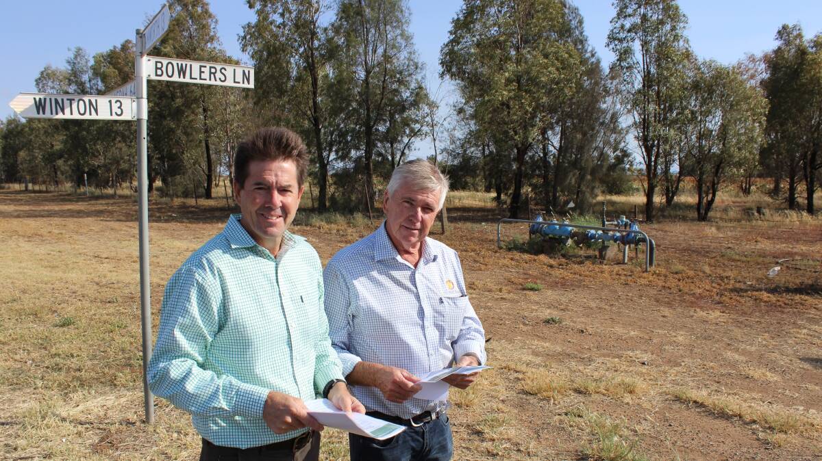 ROAD WORKS: Tamworth MP Kevin Anderson and Tamworth Regional Council deputy mayor Phil Betts ready to roll on Bowlers Lane. Photo: Supplied