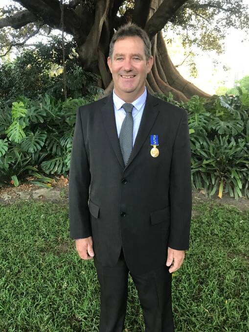 REASON TO SMILE: Barraba's Rob Sweeney received his Order of Australia Medal in Sydney for his services to veterans and their families. Photo: Supplied.