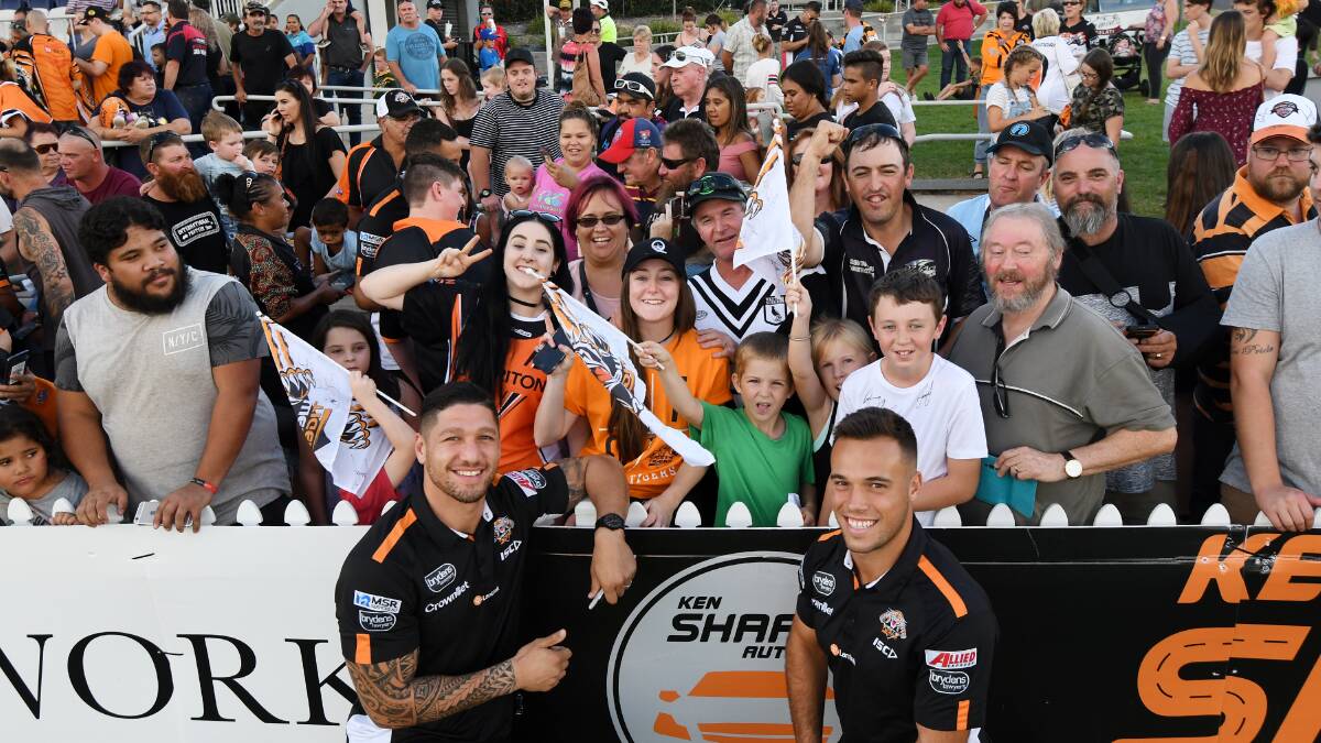 TIGER TOWN: Malakai Watene-Zelezniak and Luke Brooks meeting with fans at Scully Park ahead of Saturday's clash with Newcastle. Photo: Gareth Gardner 200418E023