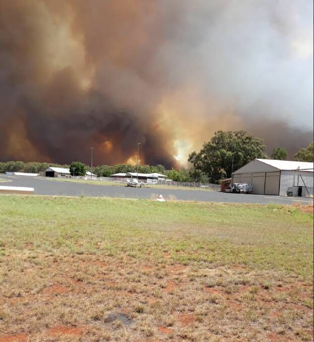 FIRE FRONT: Smoke can be seen from the Inverell airport billowing into the air. Photo: Rob Rogers NSW RFS