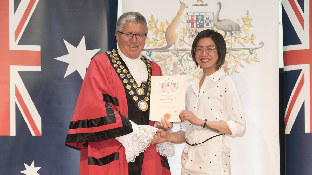 TEARS OF JOY: Barraba's Daina Flores receives her certificate from Tamworth mayor on Australian Citizenship Day. Photo: Peter Hardin 170919PHA061
