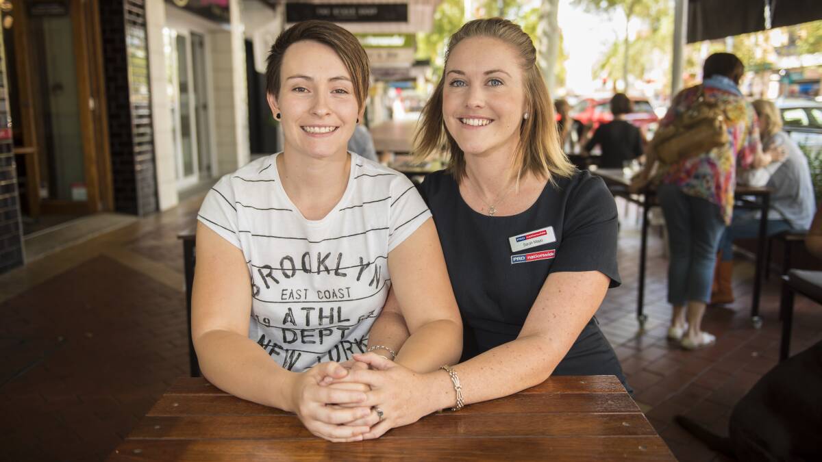 LOVE STORY: Tamworth couple Lucy McCowen and Sarah Mayo are hoping to change some minds on marriage equality. Photo: Peter Hardin 150317PHD017