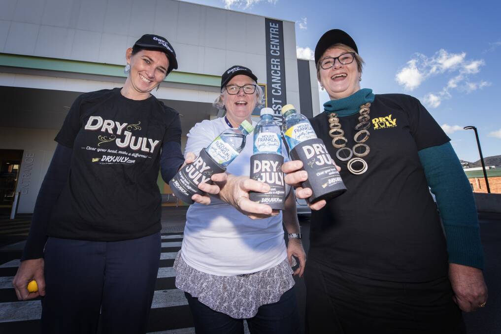 CHEERS TO YOU: Renee Moore, Shaen Fraser and Marg Macpherson are swearing-off booze for a month to raise money for cancer patients. Photo: Peter Hardin 240619PHA009