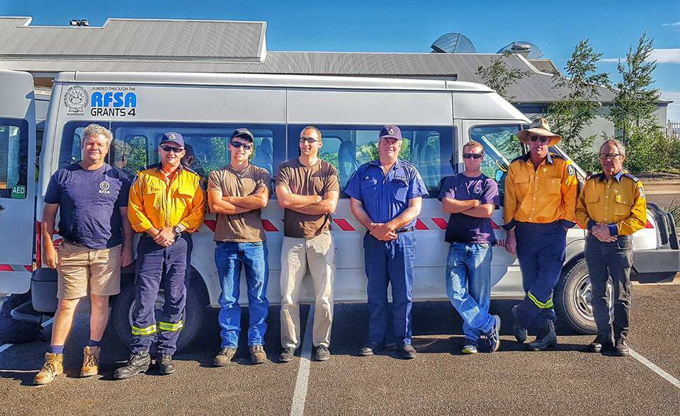 HERE TO HELP: New England volunteer firefighters flew to Queensland on Sunday to assist with the state's bushfire situation. Photo: Northern Tablelands Team, NSW RFS