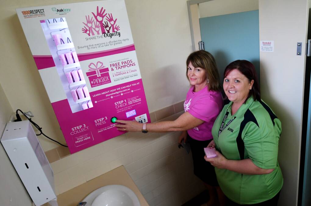 REACHING OUT: Share the Dignity team leader Annie Turner and Bec Butler from the Coledale centre with the 'pink box'. Photo: Gareth Gardner 020419GGC03