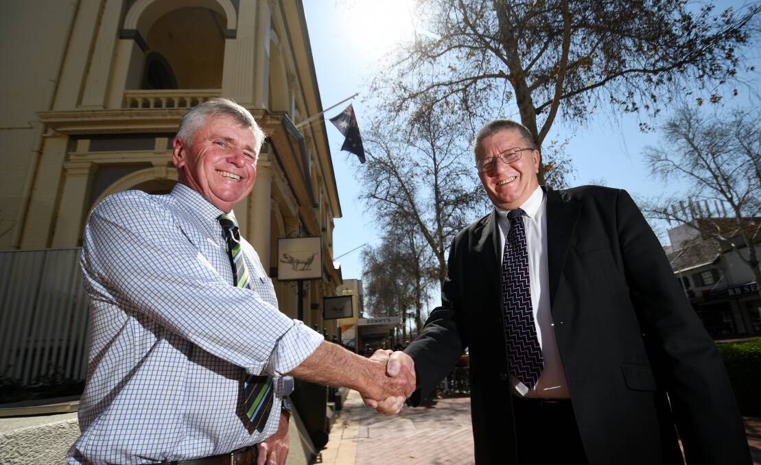 STARTING TO BITE: Mayor Col Murray (right) says it'll be hard to make one million bucks go a long way. Photo: Gareth Gardner 120918GGB01