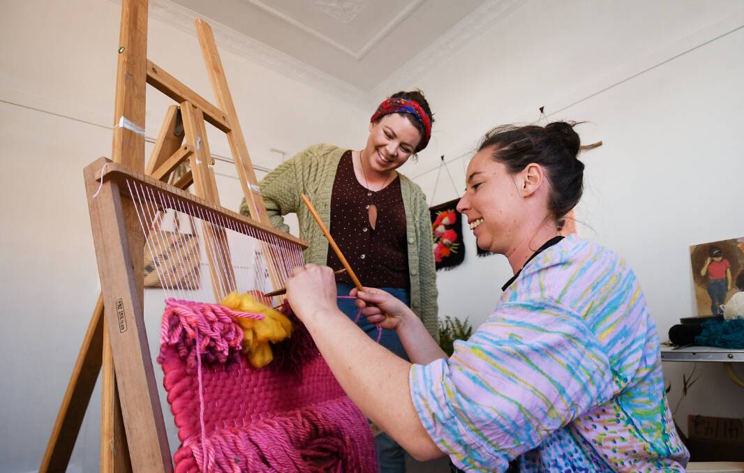 MESSAGE AT ART: Tamworth sisters Emily and Sophie Honess are running art workshops with a looming theme of sustainability. Photo: Gareth Gardner 310718GGB001