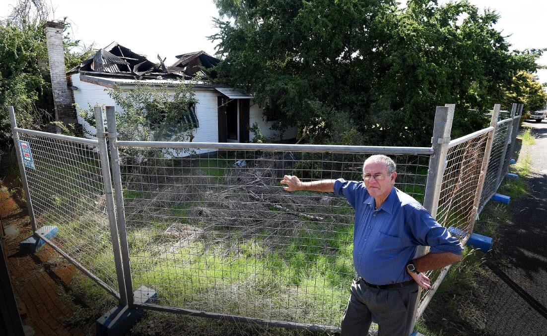 GOING ONCE: Tamworth councillor Jim Maxwell checks out the dilapidated dwelling in Manilla. Photo: Gareth Gardner 270317GGE03