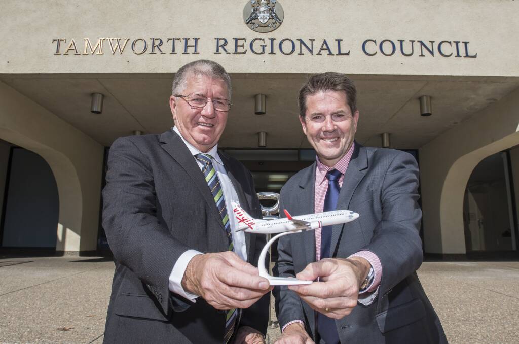 IN THE AIR: Tamworth mayor Col Murray and state MP Kevin Anderson at the announcement of the Virgin flight school last year. Photo: Peter Hardin 311018PHA130